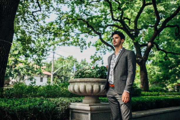 istock Man in a suit in the park 1179582574