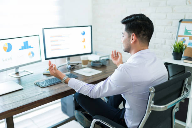 istock Relaxed Finance Professional Practicing Yoga At Home 1179583225