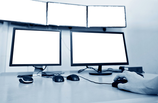 Computer monitors in control room