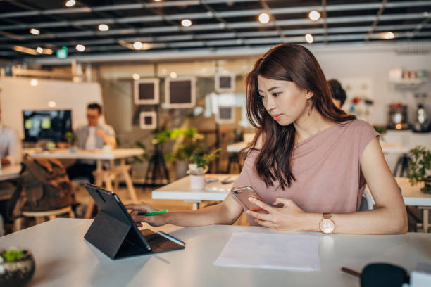 istock Beautiful Taiwanese lady in office 1179584190