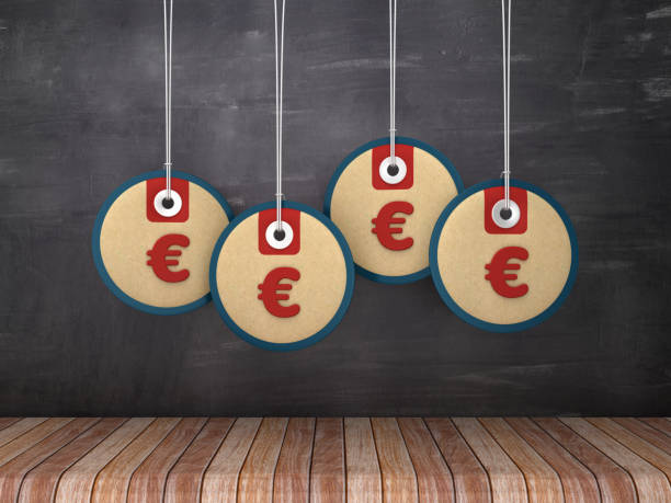 euro sign price tags hanging on chalkboard background - 3d rendering - selling buy cube three dimensional shape imagens e fotografias de stock