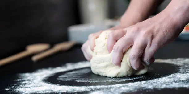 making homemade Italian-style pizza
