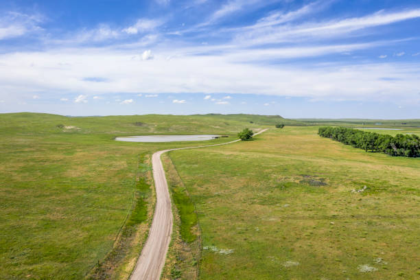 istock sandy ranch road in Nebraska Sandhills, 1179590196