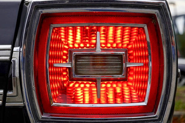 istock American vintage car glowing taillight 1179591515