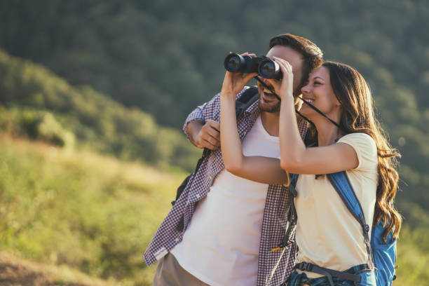 istock Happy couple is hiking in mountain. 1179591526