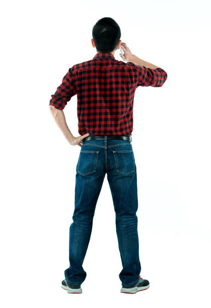 young asian man taking off sweater isolated on white background