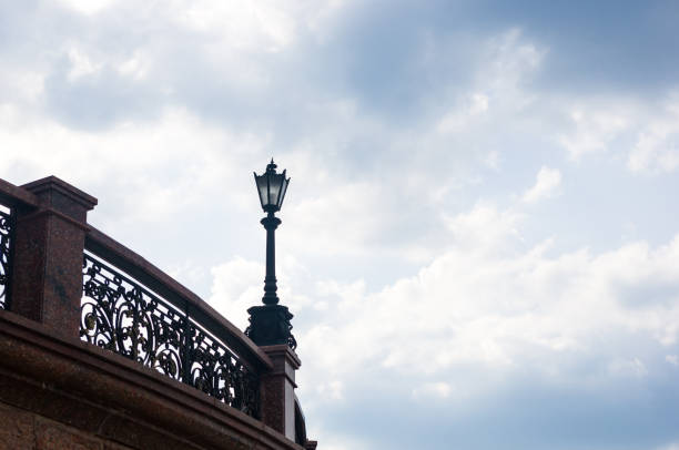 Classic style city lamppost at sunset, close-up