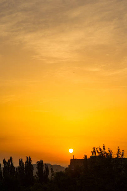 istock Landscape with dramatic light - beautiful golden sunset with saturated sky and clouds. 1179594296