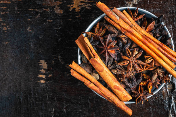 istock Cinnamon spices and anise stars in a bowl on the table 1179594827