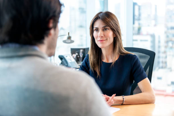 istock Woman Interviewing a man for a job 1179595801