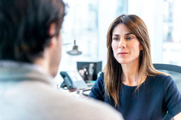 istock Woman Interviewing a man for a job 1179595979