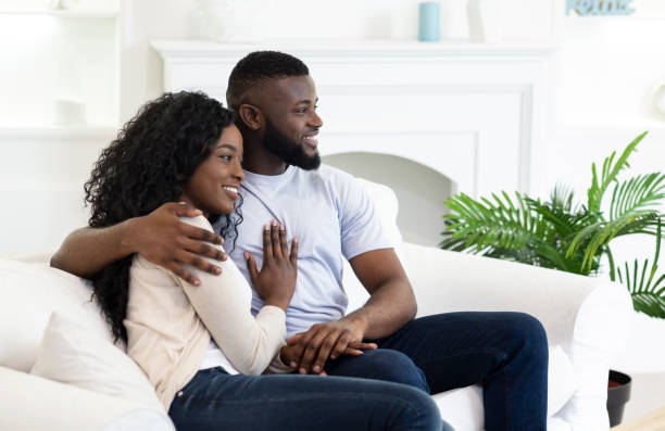 istock Married black couple enjoying weekend at home 1179597523