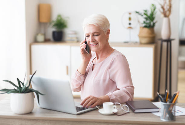 istock Ambitious elderly business woman working from home 1179598744