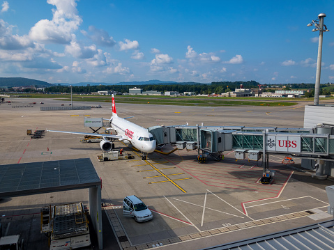 Zurich, Switzerland - July 19, 2018: Swiss airlines airplane at runway day time in international airport, side view