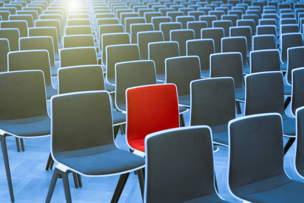 istock Standing Out From The Crowd- Special Seat in Auditorium 1179599305