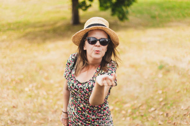 istock Woman sending air kiss 1179599711