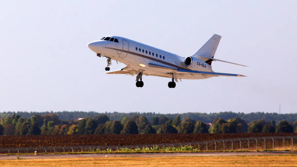 CS-DLG NetJets Europe Dassault Falcon 2000 aircraft departing from the Borispol International Airport stock photo