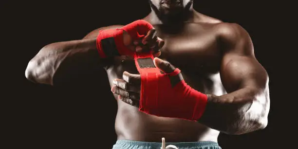 Photo of Close up of young man getting ready for fight