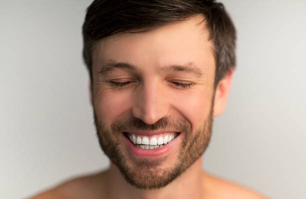 istock Middle Aged Man Smiling With Closed Eyes In Studio 1179600645