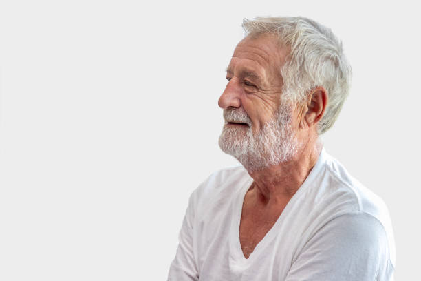 istock Senior elderly man in casual shirt isolated on grey background 1179600670