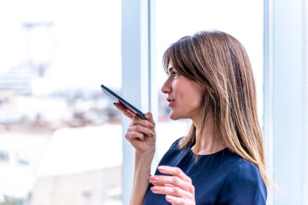 istock Businesswoman using smartphone 1179601288