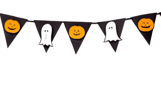 istock Halloween creative garland with pumpkins and ghosts 1179602483