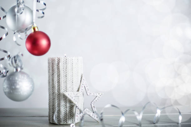 istock Silver Christmas candle with ribbon 1179602640