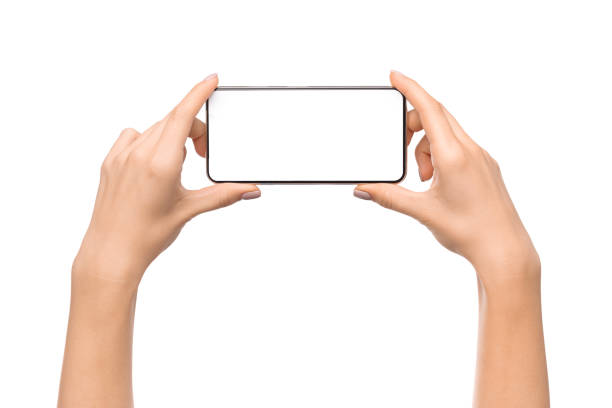 istock Young woman holding smartphone with blank screen in horizontal orientation 1179604226