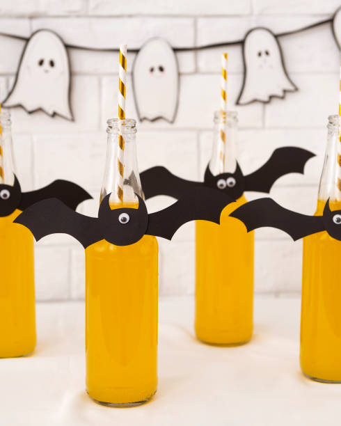 istock Close up of creative halloween cocktails over bricks wall 1179604529