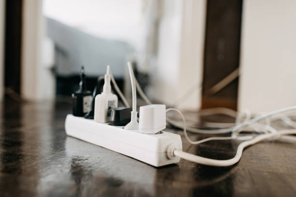 Too many wall chargers Too many wall chargers wired stock pictures, royalty-free photos & images