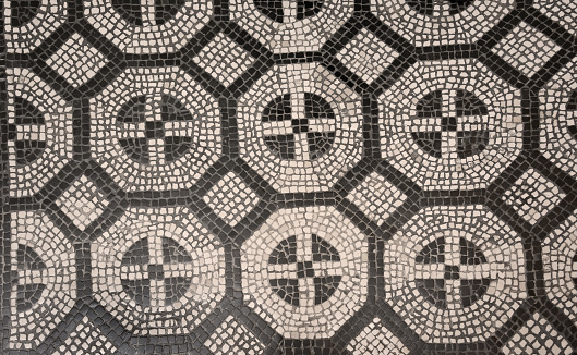 Mosaic pattern in black and white color background. Decorated floor in the Vatican museum, Italy