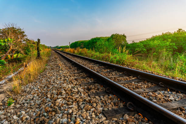 istock Railroad and railway train transportation with color of sky sunlight 1179607355