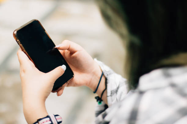 istock Young Asian Female Typing on Smartphone Connection Communicate with People 1179607835