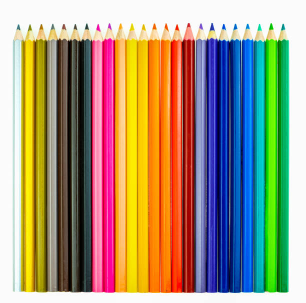 color pencil on dark background, aligned color pencils, colorful pencils in white coffee mug