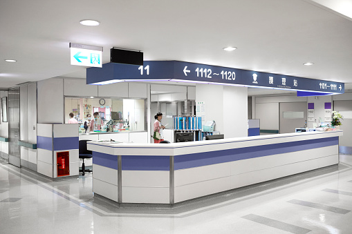 Empty reception in hospital. Healthcare workers working in laboratory. Interior of medical clinic.