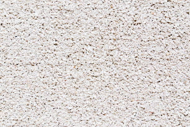 istock White granite crumbs decorative stucco wall texture background. 1179608758