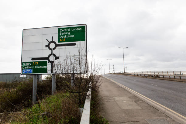 istock Road sign to London 1179610564