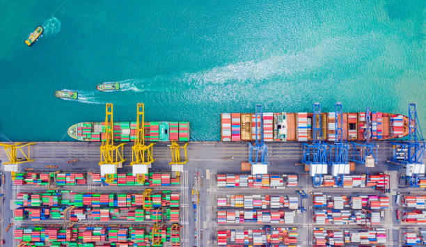 istock Top view of Deep water port with cargo ship and containers. It is an import and export cargo port where is a part of shipping dock and export products worldwide 1179611315
