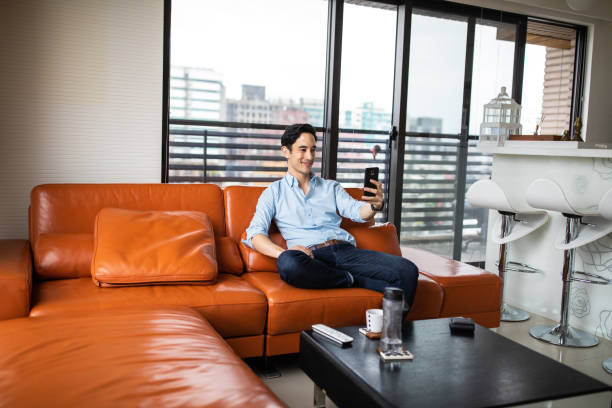 istock Having video call with his friends 1179613153