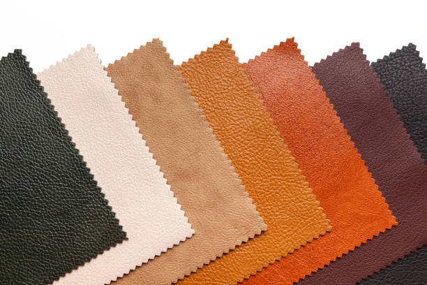 Samples of natural, textured, multi-colored leather. Top view.