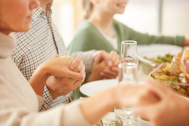 istock Family praying at the table 1179617658
