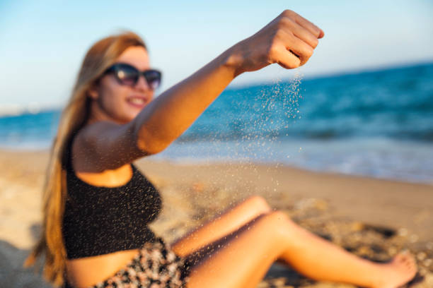 istock Woman on the beach 1179618524