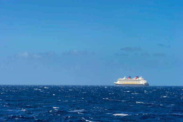 Top deck of a cruise ship with beautiful cloud scape background in the morning.