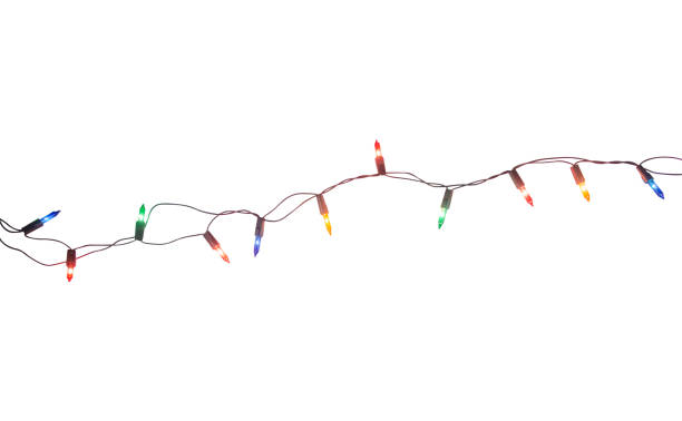 cadena de luces navideñas aisladas sobre fondo blanco con trazado de recorte - christmas lights fotografías e imágenes de stock