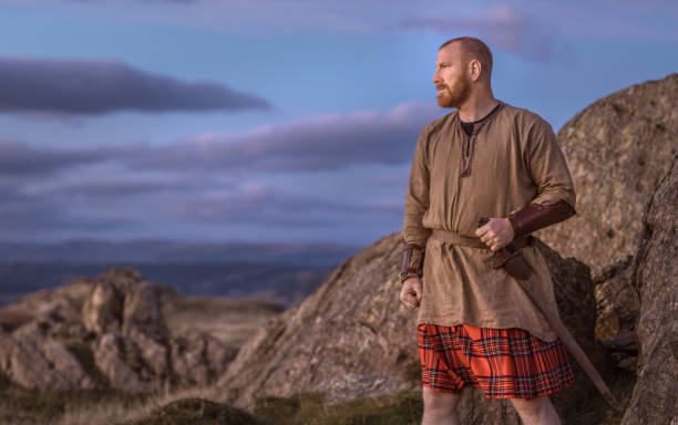 istock Scottish Redhead Warrior wearing a kilt 1179620392