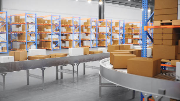 istock Packages delivery, parcels transportation system concept, cardboard boxes on conveyor belt in warehouse. Warehouse with cardboard boxes inside on pallets racks. Huge modern warehouse, 3D Illustration 1179621910