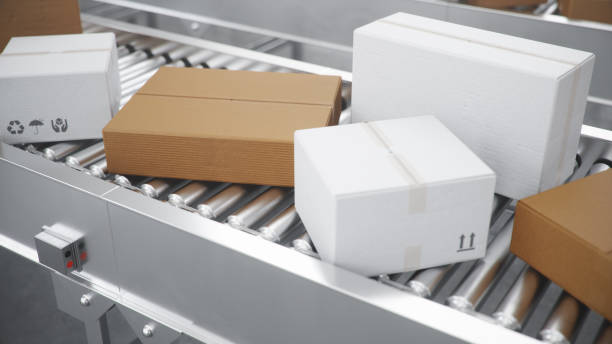 istock Packages delivery, packaging service and parcels transportation system concept, cardboard boxes on a conveyor belt in a warehouse. Three conveyor belts, 3d illustration 1179622568