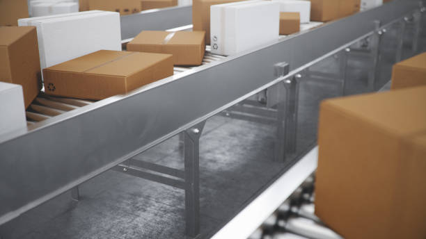 istock Packages delivery, packaging service and parcels transportation system concept, cardboard boxes on a conveyor belt in a warehouse. Three conveyor belts, 3d illustration 1179622570