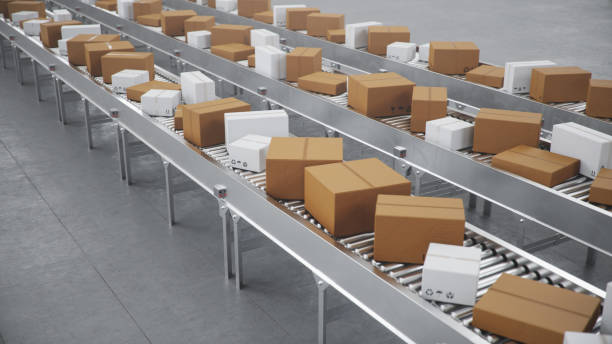 istock 3D illustration Packages delivery, packaging service and parcels transportation system concept, cardboard boxes on a conveyor belt in a warehouse, Three conveyor belts 1179622589