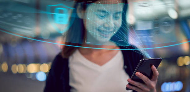 istock Face identification technology concept, Asian woman holding smartphone and scanning face ID recognition system. 1179622671